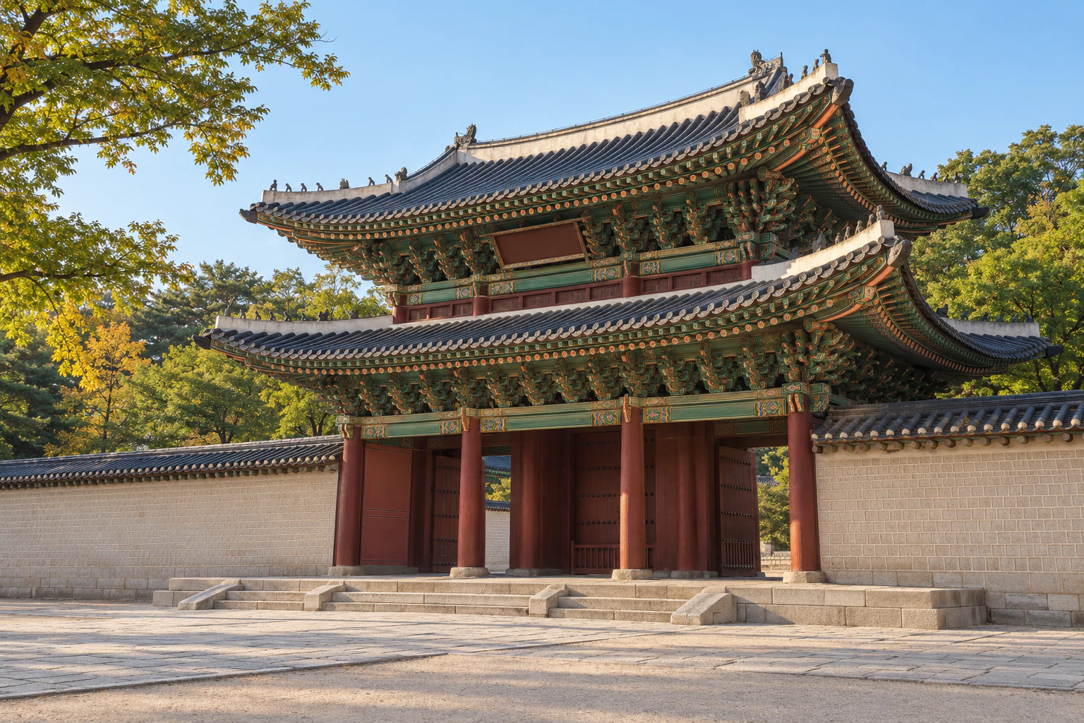 돌계단과 붉은 기둥 위에 두 층 지붕을 얹은 궁궐 정문, 현판 판독 불가, 사람 없음. 편집 이미지.