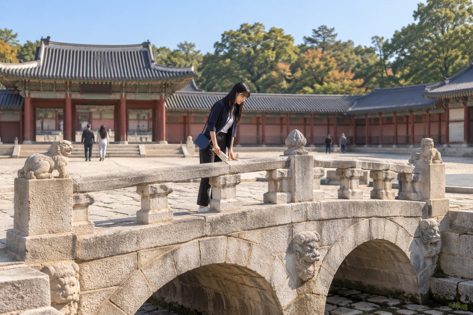 A woman leaning slightly by a stone bridge railing to look down, seen in full length from the side. Editorial image.